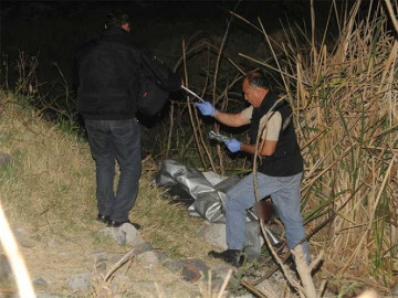 Encuentran a mujer muerta en lote baldío