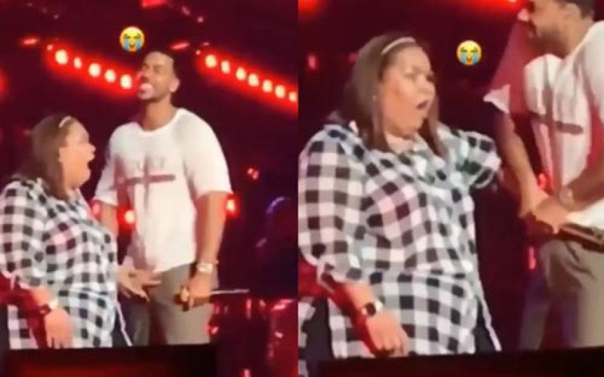 Romeo Santos deja que fan le toque sus partes íntimas