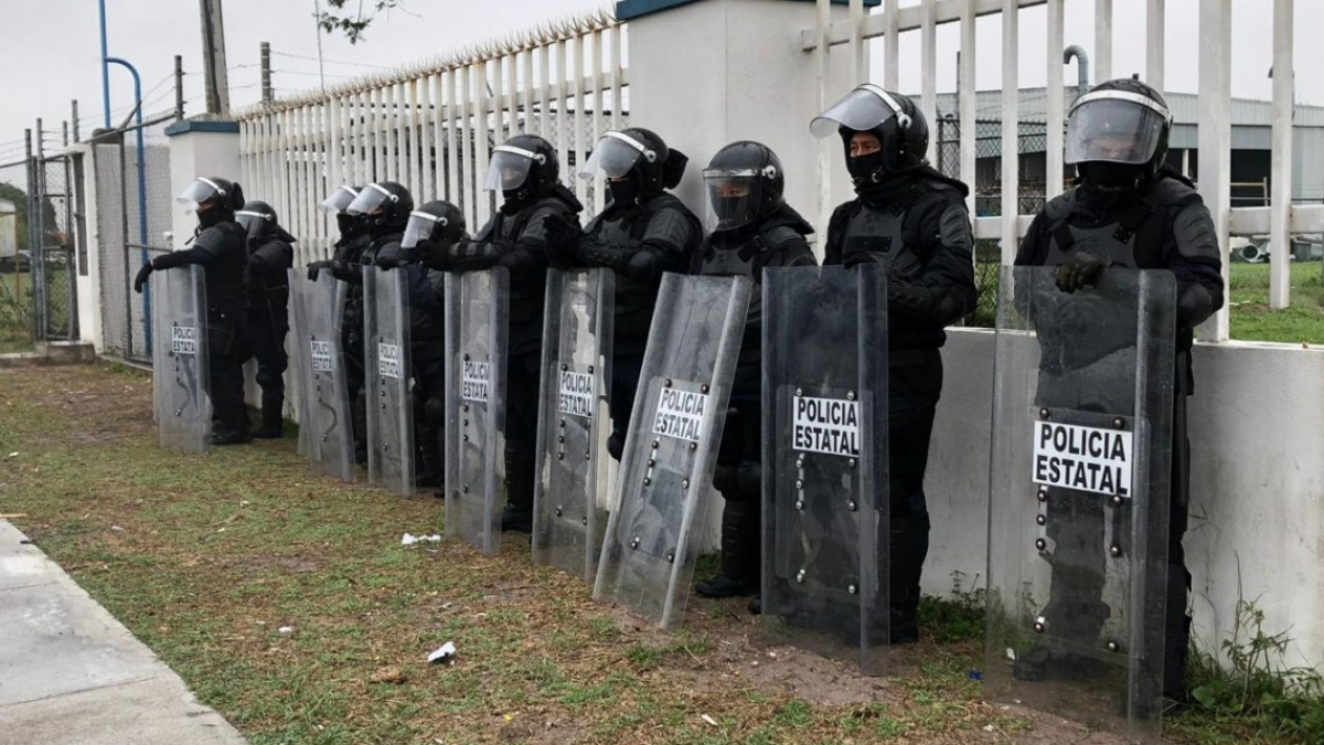 Policía antidisturbios prepara desalojo de obreros en Mecalux